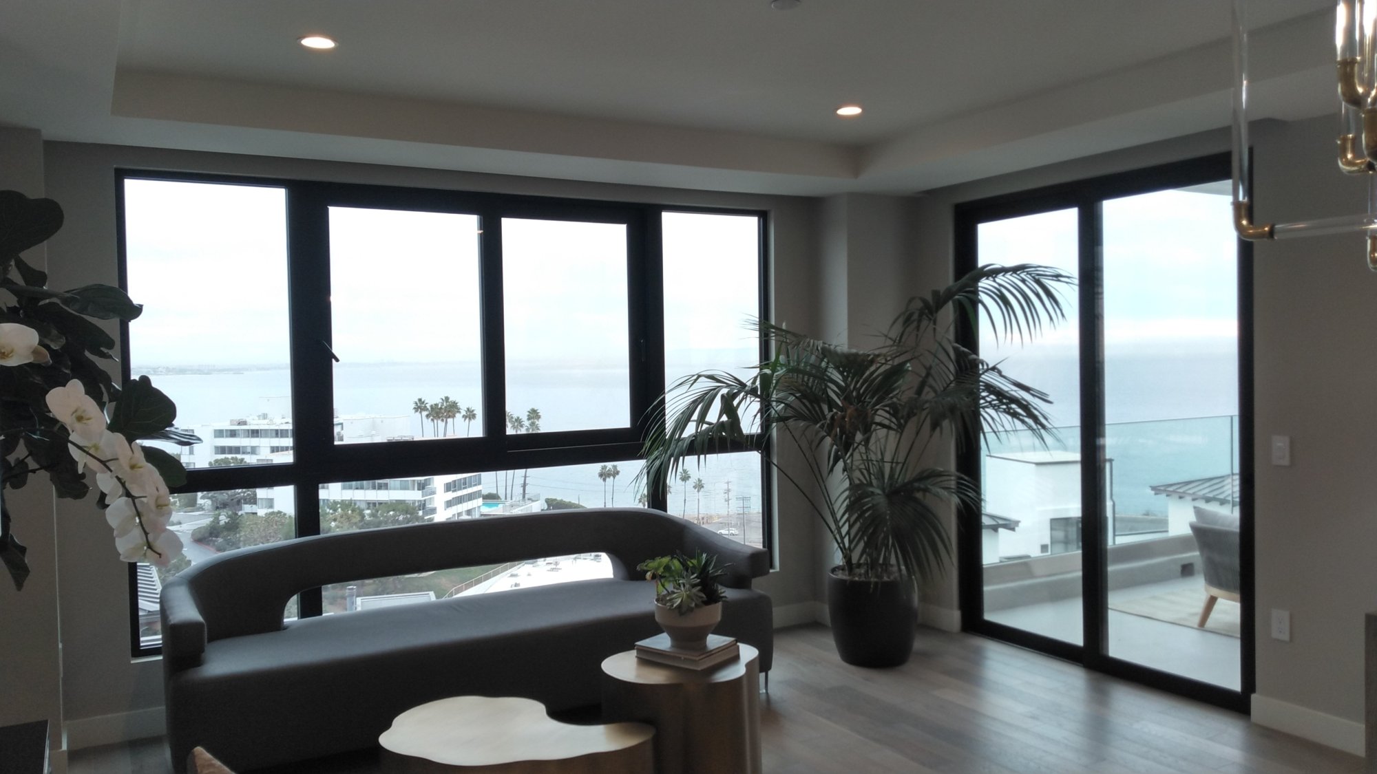 Ocean-view window and glass door installation at Tramonto in Pacific Palisades